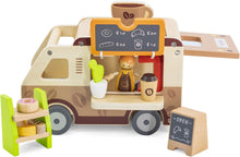 Wooden toy coffee truck with a character serving a coffee, surrounded by additional wooden items on a white background.