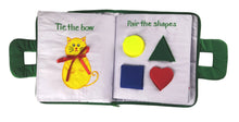 Children's book with interactive elements on a plain background