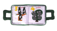 Children's book with pages showing koalas and magpies on a white background